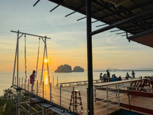 Sunset over limestone cliffs at Ao Luek Ocean View
